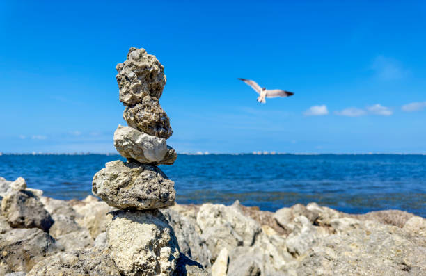 Close up pile of rock over sunny blue sky at seaside in Sarasota, Florida