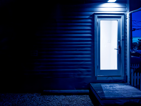 Residential building door at night in Key West, Florida