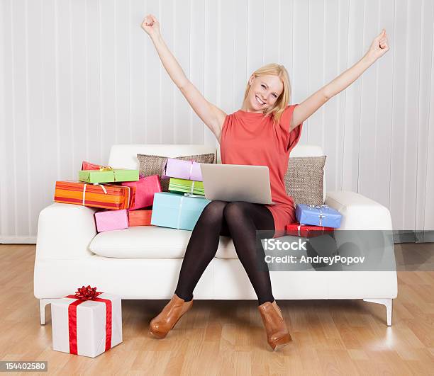 Beautiful Young Woman Buying Presents Stock Photo - Download Image Now - Adult, Beautiful People, Beauty