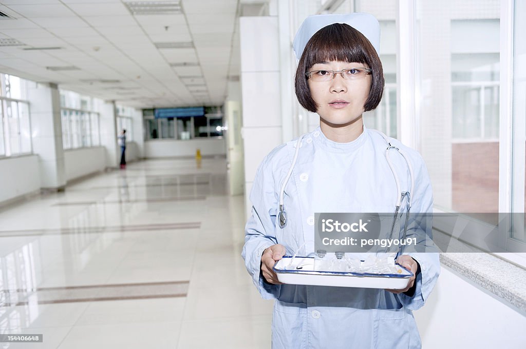 Infermieri in ospedale di lavoro - Foto stock royalty-free di Adulto
