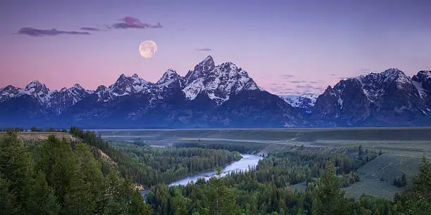 Photo of Moon setting over the Tetons