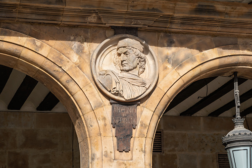Salamanca, Spain - Mar 16, 2019: Medallion with effigy of Antonio de Nebrija at Plaza Mayor Square Facade - Salamanca, Spain