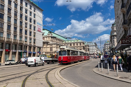 Vienna, Austria - July 7, 2016: Viennese trams are easy to spot, being large, unsurprisingly tram-shaped, and decked out in the distinctive red and white