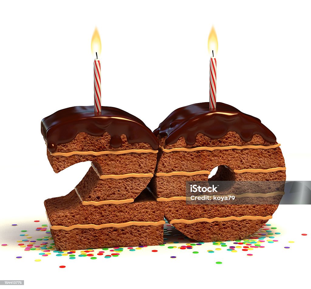 number twenty shaped chocolate cake Chocolate cake surrounded by confetti with lit candle for a twentieth birthday or anniversary celebration  Number 20 Stock Photo