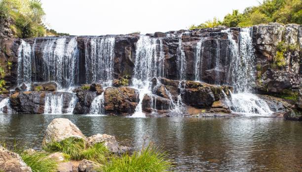 istock Beautiful waterfall cascading over an array of rocks in Southern Brazil 1544143726