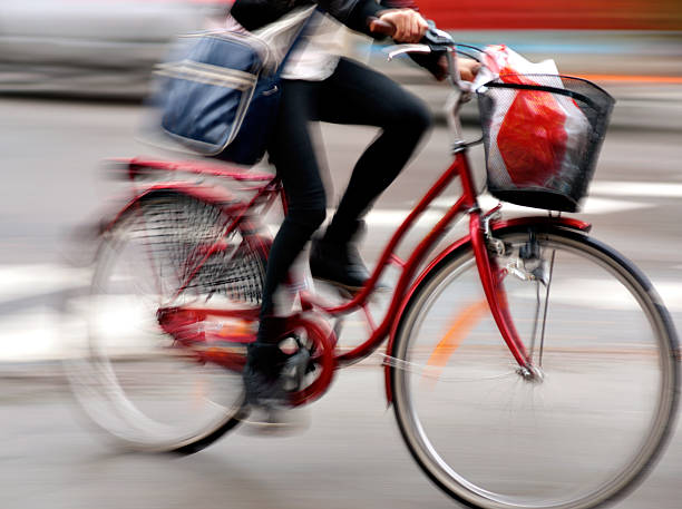 istock young woman on bike 154417332