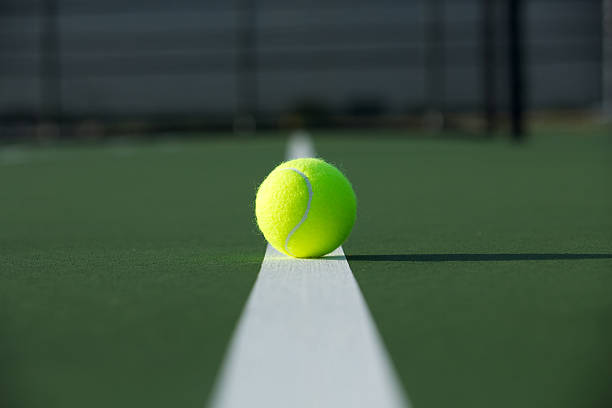 istock Tennis Ball on the Court 154417921