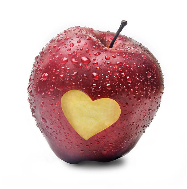 istock red apple with a heart symbol 154418817