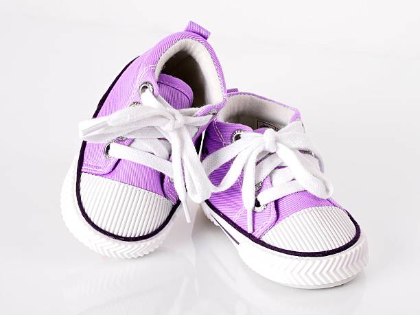 istock Pink baby shoes with reflection 154419008