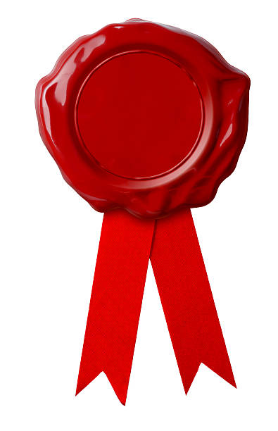 istock Red wax seal with ribbon isolated on white 154420814