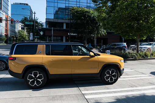Seattle, USA – Jul 6rd, 2023: An electric Rivian R1S SUV in South Lake Union late in the day.