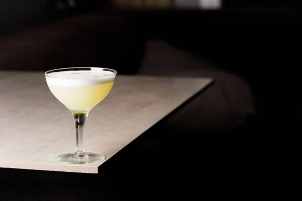 istock Pisco Sour Cocktail alcoholic Pisco, fresh lemon juice, syrup and egg white 1544352572