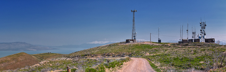 Radio Tower Observatory on West Lake Mountain Peak spring mountain hiking trail, Utah Lake, Wasatch Front Rocky Mountains, Provo, Utah. USA.