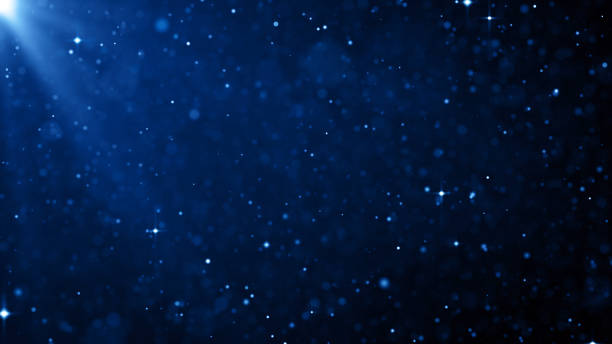istock Particles Blue dust abstract light bokeh motion titles cinematic background 1544410280
