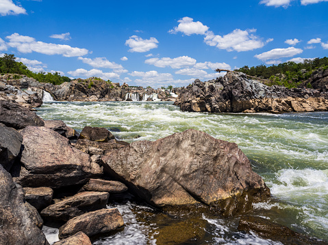 Majestic Great Falls roars and cascades in a breathtaking display of natural beauty. Located in Virginia, USA, it captivates with its awe-inspiring grandeur.