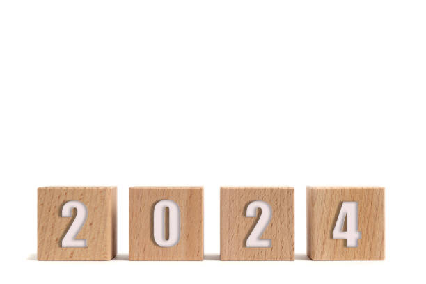 istock Wooden cubes with numbers 2024, white background. 1544422234