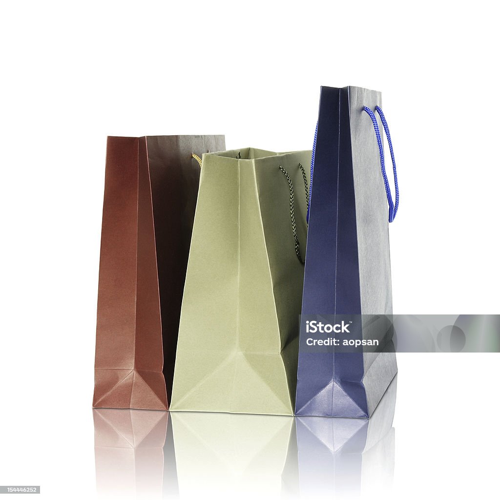 Colorful shopping bags Colorful shopping bags on reflect floor and white background Bag Stock Photo