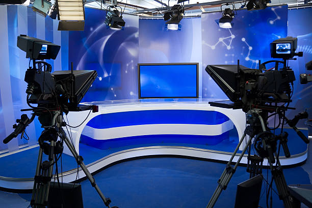 TV studio with camera and lights TV studio with camera and lights - Prepared for the production and shooting stage set stock pictures, royalty-free photos & images