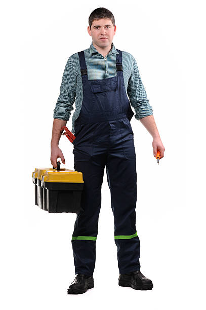 istock Mechanic with tools isolated on the white background 154451579