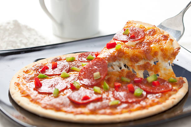 istock Slice of pepperoni pizza 154451945