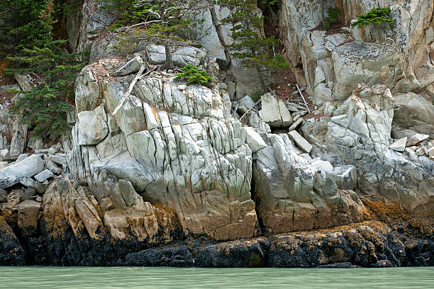 istock Rocks create a wall of stone in beautiful colors. 154453342