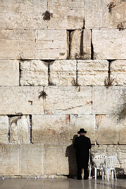 istock Jewish praying at the wailing wall 154453458