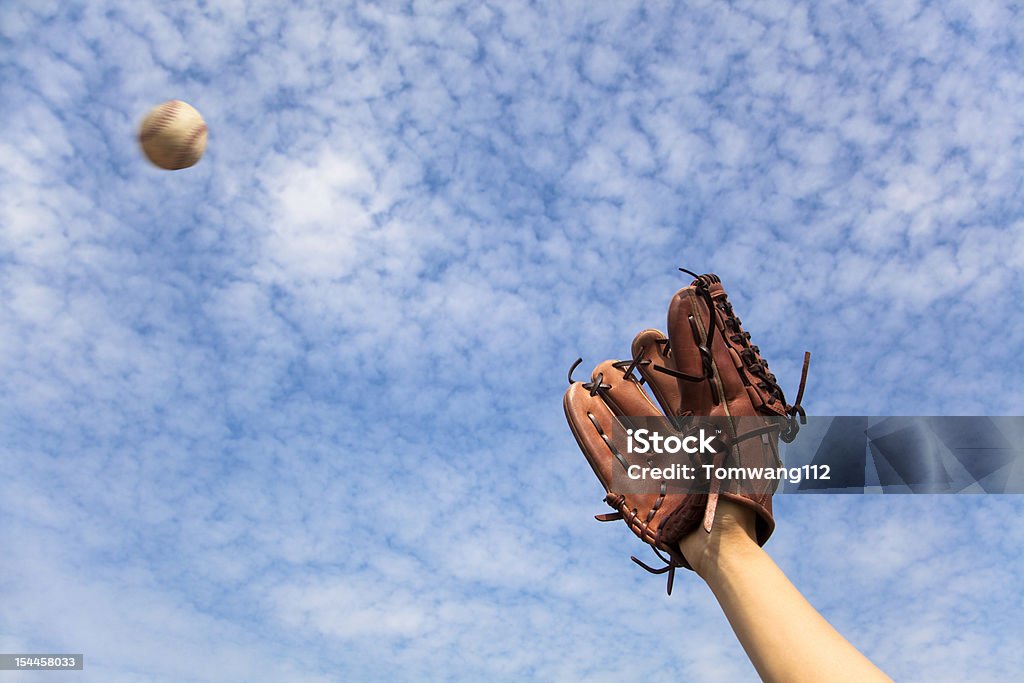 baseball glove and ready to  catching hand in baseball glove and ready to  catching the ball Baseball - Ball Stock Photo