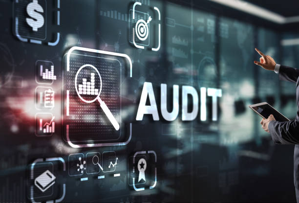 Audit. Checking the financial statements of the company. Businessman touching Audit on 3d virtual screen Audit. Checking the financial statements of the company. Businessman touching Audit on 3d virtual screen. audit stock pictures, royalty-free photos & images