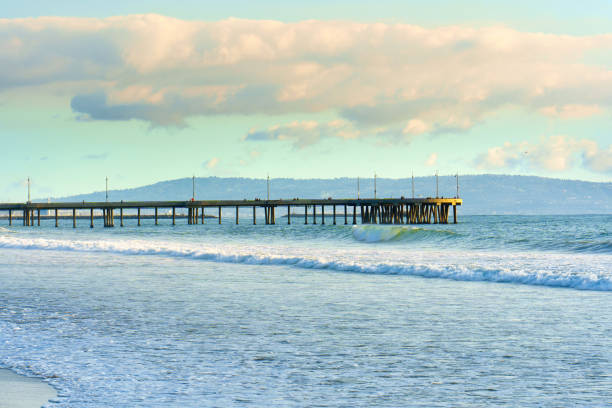 istock Scenic View of Venice Beach Pier with Waves and Clouds 1544879466