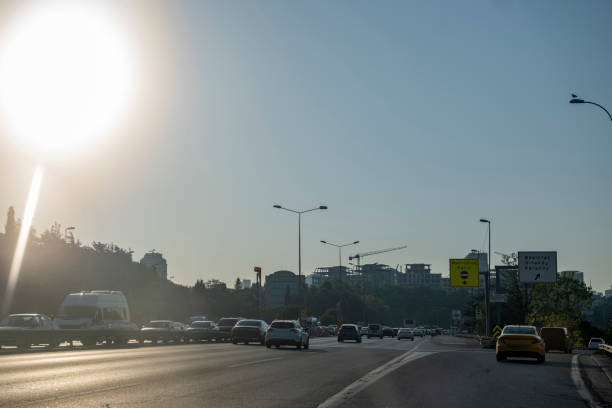 istock Cars on road to sunny day 1544924207