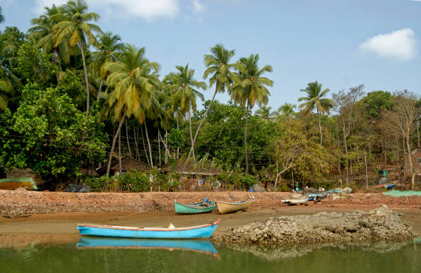 istock Parked fishing boats on sandy beach 1544973813