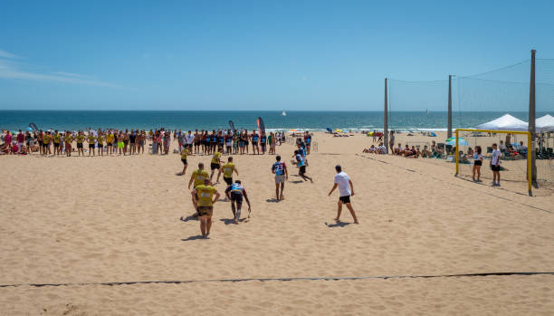 People playing beach football with a large crowd of spectators at Carcavelos Beach. Lisbon. Portugal- 07.08.2023. People playing beach football with a large crowd of spectators at Carcavelos Beach. 11154 stock pictures, royalty-free photos & images