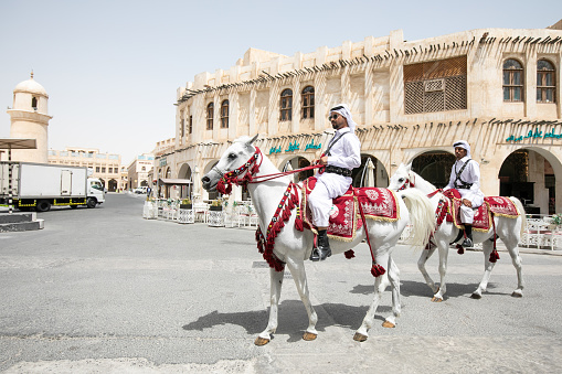 05/23/2017 Doha city, Qatar. Qatari police riding horses around the streets of Doha city.