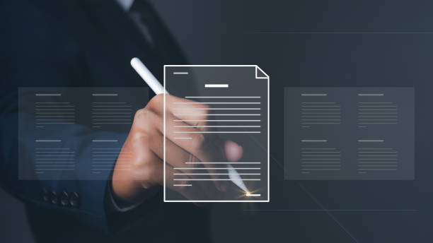 istock Man uses pen sign electronic documents on virtual screen. Electronic signature. 1545074622