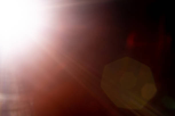 istock Blurred image Sun flare on the black background 1545090048