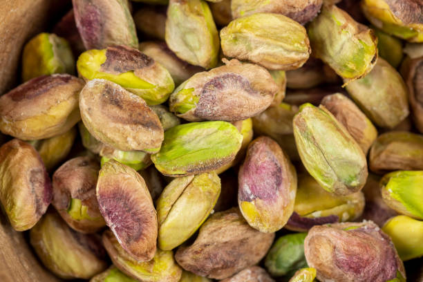 istock peeled fresh crunchy pistachios, green nuts pistachios 1545102533