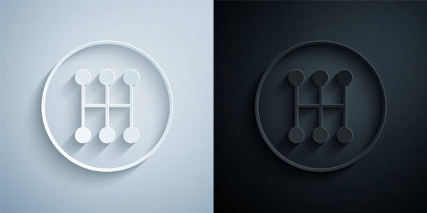 istock Paper cut Gear shifter icon isolated on grey and black background. Manual transmission icon. Paper art style. Vector 1545111989