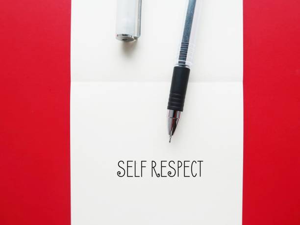 istock Notebook on red background with handwritten text SELF RESPECT - means self love, treat yourself with care. Staying true to your values. 1545117795