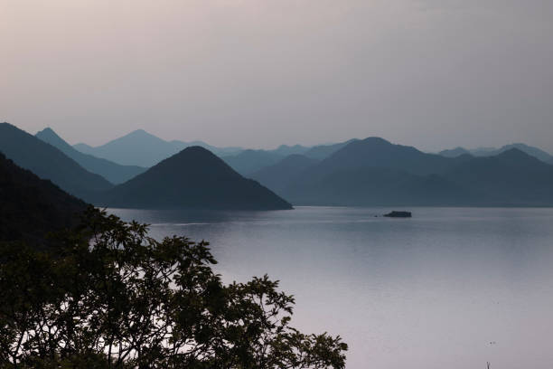 Hazy sunset on the lake Skadar