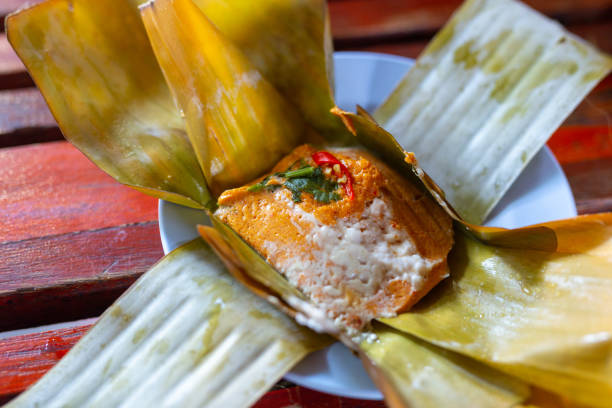 istock Closeup Steamed fish with curry paste on dish in Restaurant 1545256475