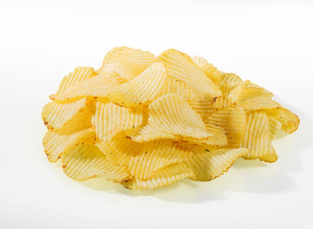 istock A bunch of potato chips with dill on a white background 1545257581