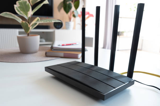 istock Router with 4 antennas in living room 1545261415