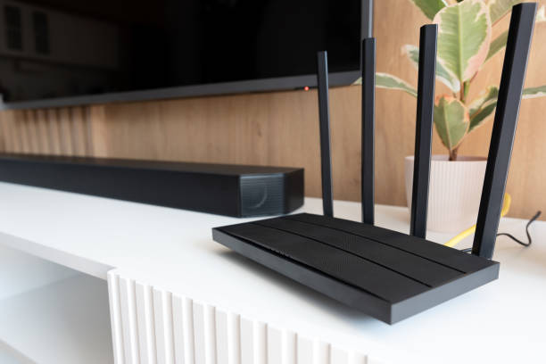 istock Router with 4 antennas in living room 1545262461