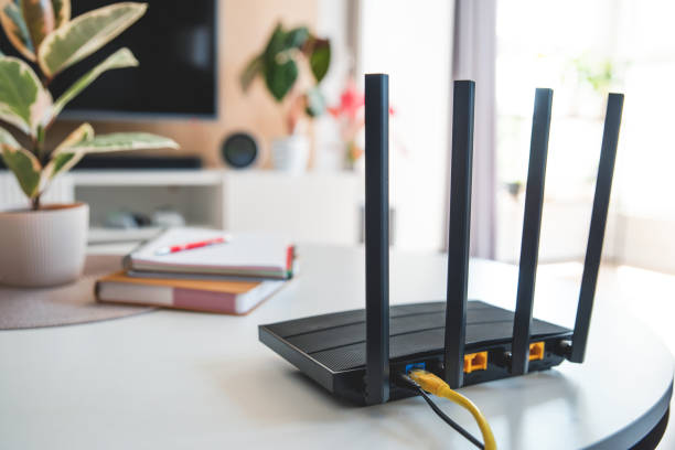 Router with 4 antennas in living room stock photo