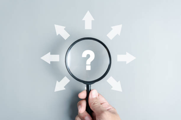 istock Magnifier Question with multiple arrow surround new way options and growth opportunities for business and solution concept. 1545309844