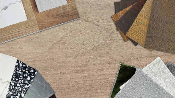 istock interior material samples including wooden laminated and vinyl flooring tiles swatch, marble stone quartz swatch, fabric draperies, ceramic tile placed on wooden table with space for design. 1545310670