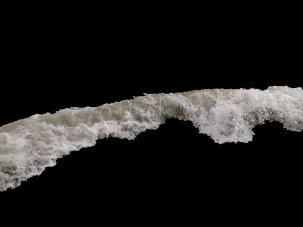 istock water splash. sea wave with foam isolated on a black background 1545374249