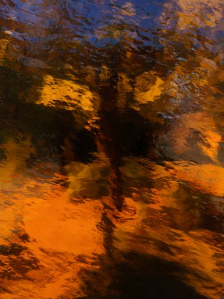 istock yellow glass. abstract blurred background 1545383693