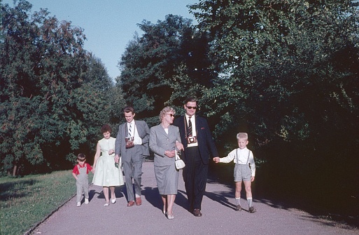 Berlin (West), Germany, 1962. Family Sunday stroll.