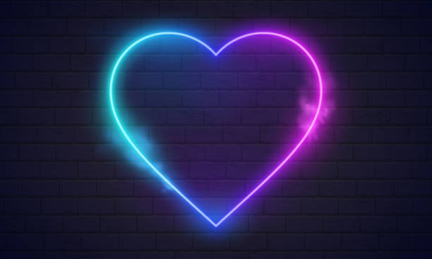 istock Neon heart. Bright night neon signboard on brick wall background with backlight. Retro glow neon heart sign. Romantic design for Happy Valentines Day. Night light advertising. Concept: valentine's day, anniversary, mother's day, marriage, invitation e-car 1545412720